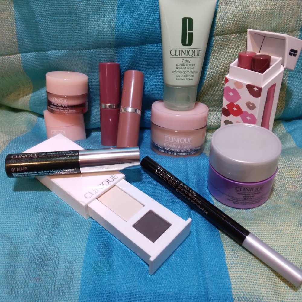 12 Clinique products: lips, eyeshadow, mascara, liner, cream, anti-aging, scrub